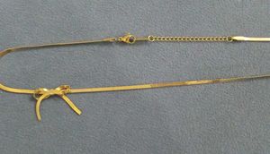 Snake Chain Bow Pendent
