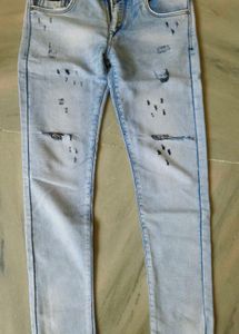 Distressed Light Wash Denim Jeans