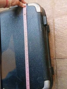 Black suitcase for tourism