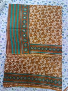 Pure Cotton Saree, In Daek Brown Colour. Best Quality And Not Used Before. Comes With Blouse Piece