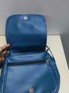 Blue Crossbody Bag with Bow Detail