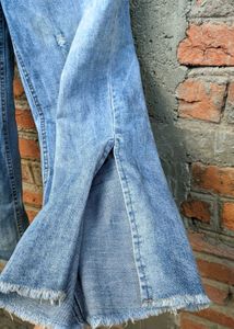 Light blue wide-leg jeans.