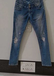 Ripped High-Waisted Jeans