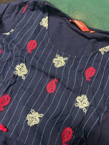 Embroidered peplum top