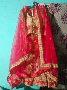 Beautiful golden and pink colour lahenga