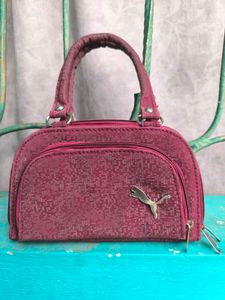 Maroon Shimmery Mini Handbag.