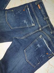 Distressed Blue Jeans