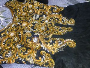 Short Frock With Heavy Embroidery On Neck