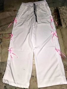 White Pants with Pink Ribbon Detail