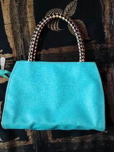 Teal Handbag with Embellishments