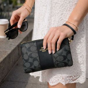 COACH Small Wristlet in Signature Canvas WD BOX