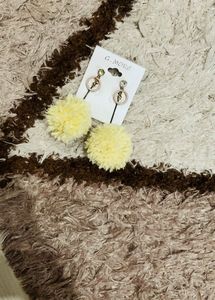 Thread pom pom earring