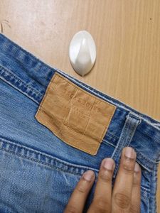 Distressed Denim Jeans