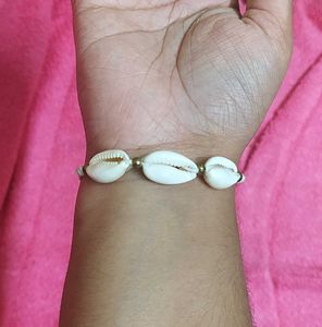 Crochet Peach Top And Bracelet.