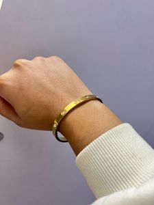 Gold Bangle Bracelet with Diamonds