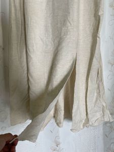 puff-sleeve cream midi dress