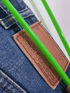 Ripped Blue Denim Jeans