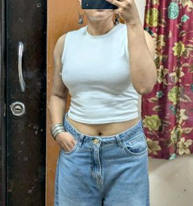 Pair Of White Sleeveless Tops