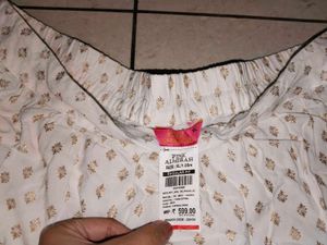 White Skirt With Golden Print