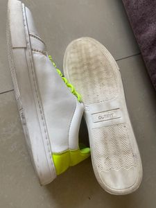 White Sneakers with Neon Green Accents