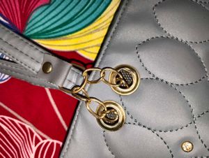 Elegant Multi-Purpose Handbag with Teddy Charm