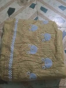 Embroidered dress material