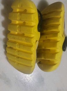 Sketchers Yellow Character Clogs