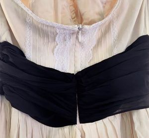 Chic Ivory Midi Dress with Black Sash