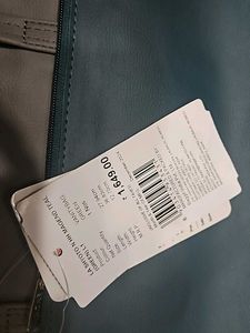 Enoki Brand New 4 Zipper Bag Never Used