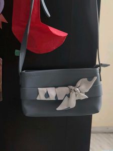 Sling Bag With Silk Like Scarf