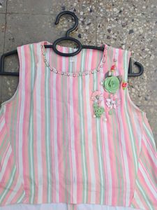 Beautiful top with flower , stone and pearl