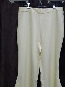 Yellow Ruffle Hem Flare Pants