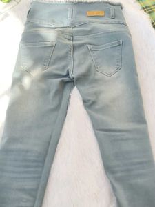 Ripped High-Waisted Jeans