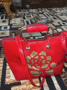 Red Handbag with Floral Detail