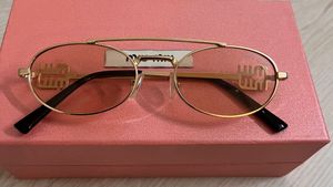 Prada (MiuMiu) Sunglasses