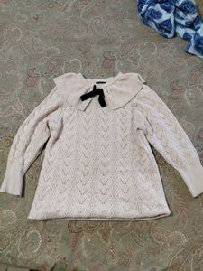 Elegant Knit Sweater with Bow Detail