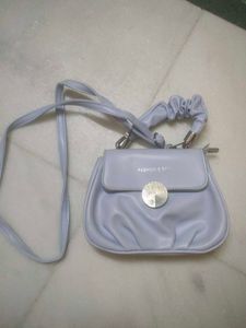 A Cute , Stylish Light Pastle Blue Sling Bag