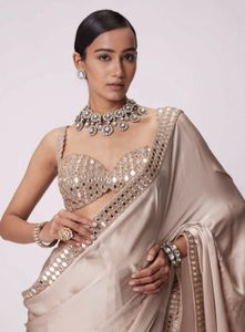 Elegant Beige Embellished Saree