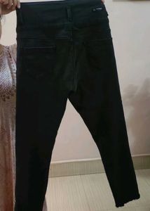 High Waisted Black Jeans with Grommet Detail