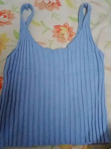 beautiful sky blue top. good condition worn only once. can style with black or blue jeans and with skirts . looks super classy.