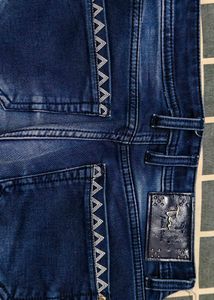 Washed Jeans with Insert Pockets