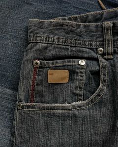 TAG WIDE LEG JEANS
