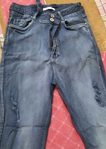 Ripped Blue Denim Jeans