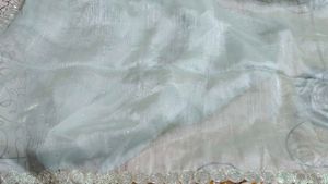 Elegant party organza saree With Stitched Blouse