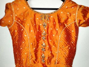 Elegant and traditional floor-length dress.