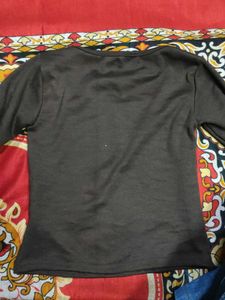 solid brown long-sleeved top