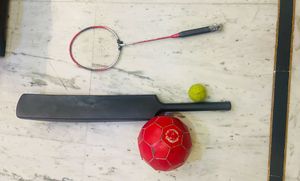 1. Plastic Cricket Bat (Black) 2. Small Red Footba