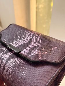 Caprese Snakeskin Clutch Wallet