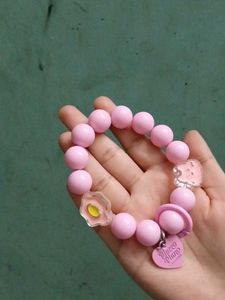 Pink Beaded Bracelet And Phone Charm