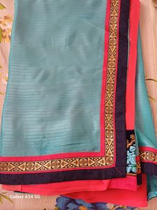 Georgette Saree With Embroidered Work In Cherry Red & Skyblue Color